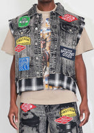 Men's black stone wash distressed cut-off denim vest with plaid and multi patches