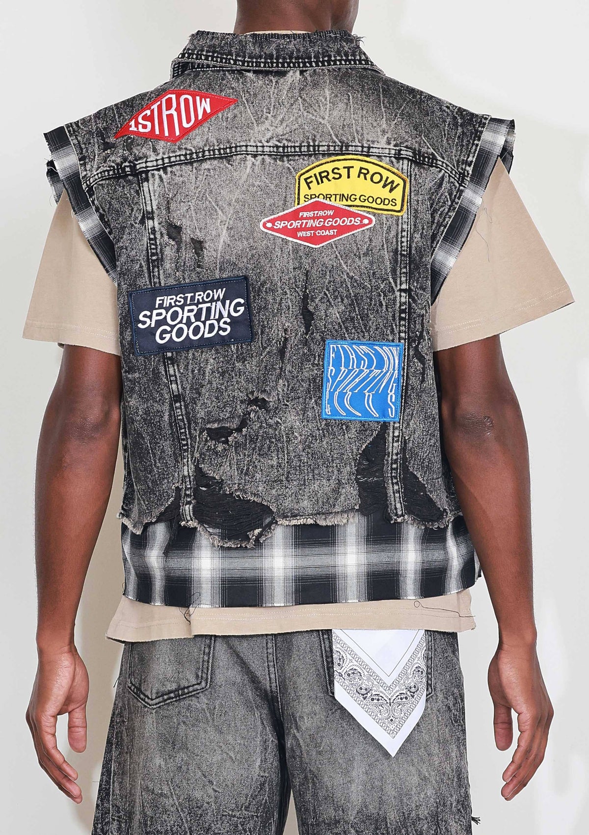 Men's black stone wash distressed cut-off denim vest with plaid and multi patches