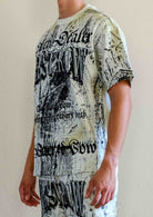 Men's celadon green washed graphic tee with flock print