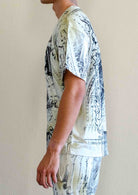 Men's celadon green washed graphic tee with flock print