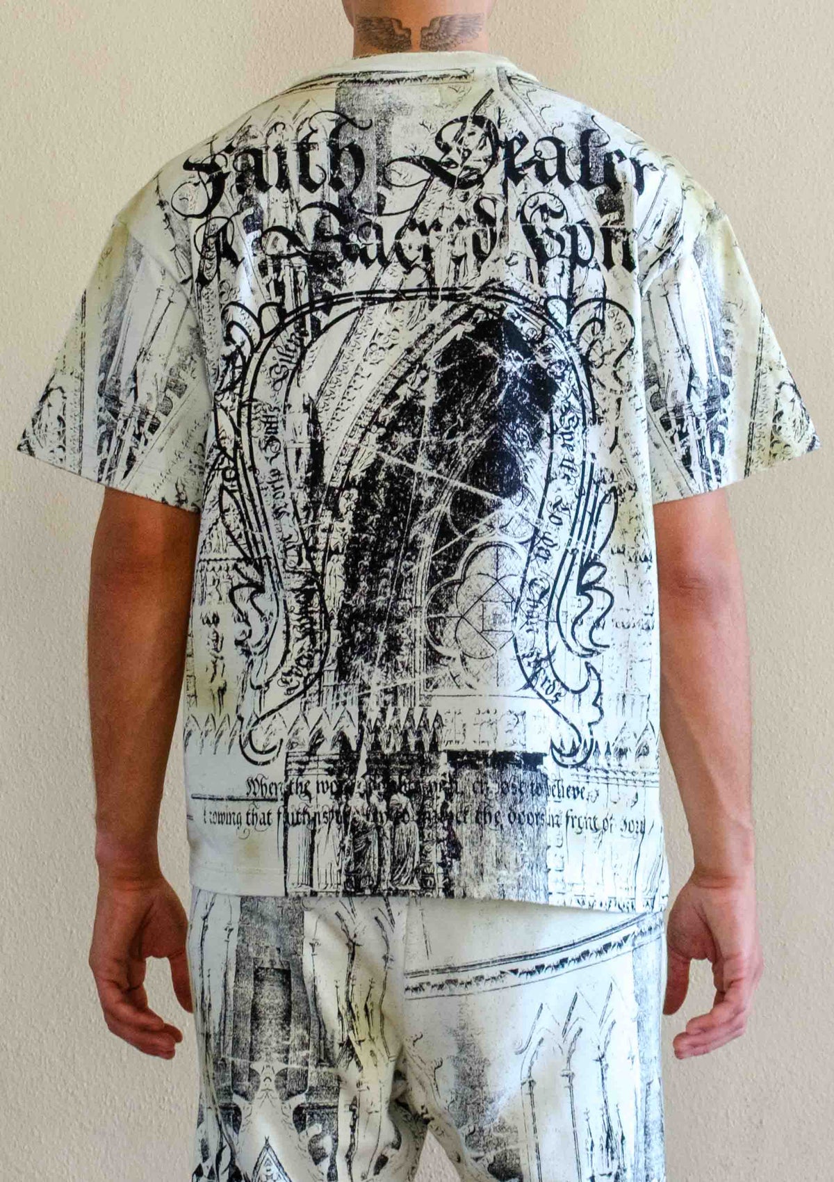 Men's celadon green washed graphic tee with flock print