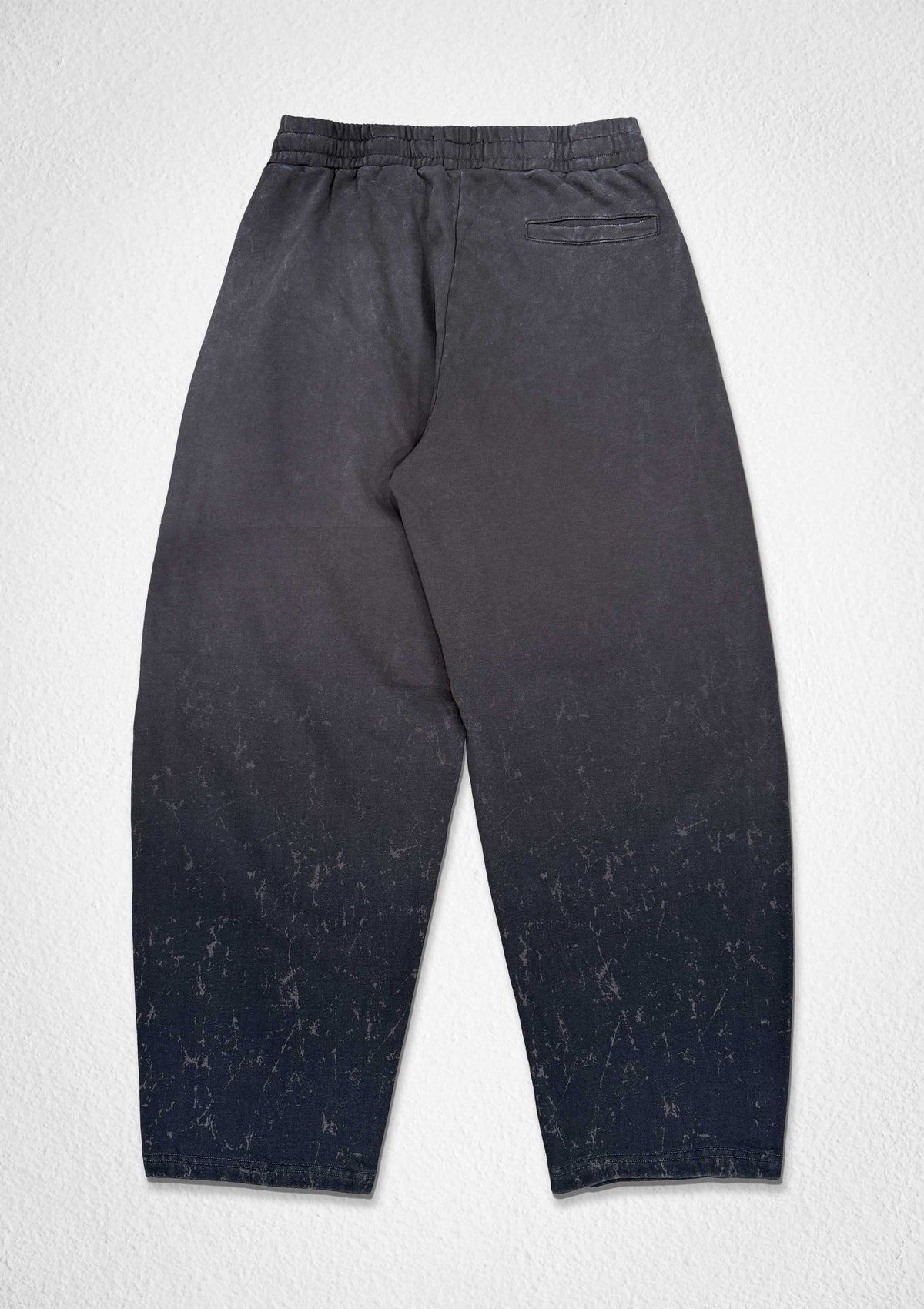 Men's caffe brown washed baggy joggers with flocked gothic graphic
