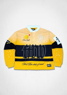 Men's yellow French terry long sleeve polo with crest patches and appliqué