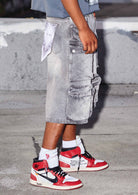 Men's grey stone denim cargo jorts with ink splatter detail