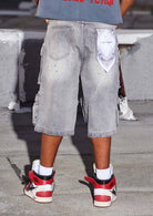 Men's grey stone denim cargo jorts with ink splatter detail