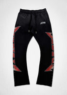 Men's black washed flare joggers with jewel stud detail