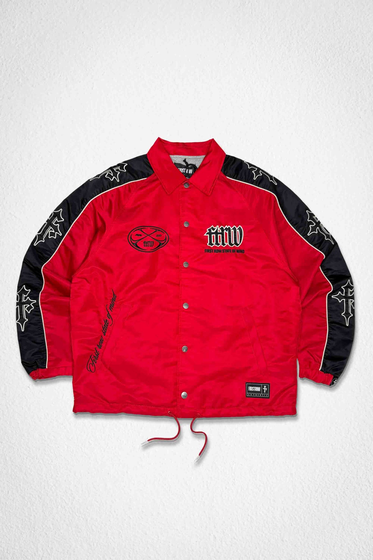 Men's red nylon coach jacket with paneled body and patch details