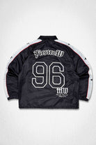 Men's black nylon coach jacket with racer-style panels and patch details