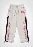 Men's ecru paneled track pants with patch detail
