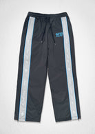 Men's gray paneled track pants with patch detail