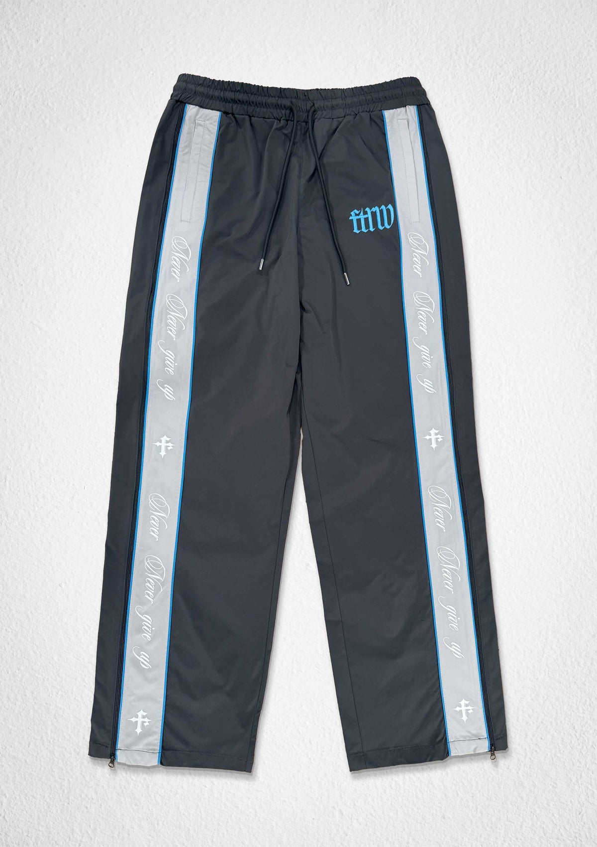 Men's gray paneled track pants with patch detail