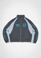Men's gray zip track jacket with paneled body and patch details