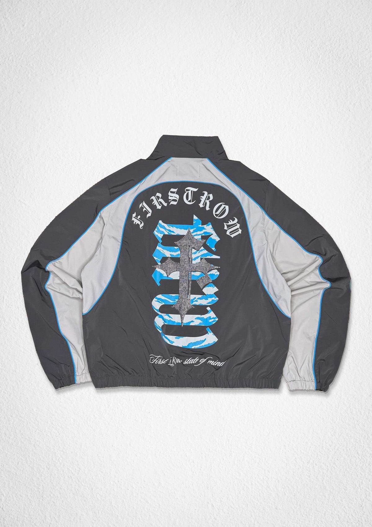 Men's gray zip track jacket with paneled body and patch details