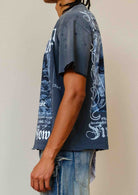 Men's dark grey washed graphic tee with rubber graphic and raw hem