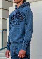 Men's dark grey washed cotton pullover hoodie with studded star graphic and kangaroo pocket