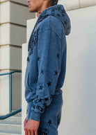 Men's dark grey washed cotton pullover hoodie with studded star graphic and kangaroo pocket