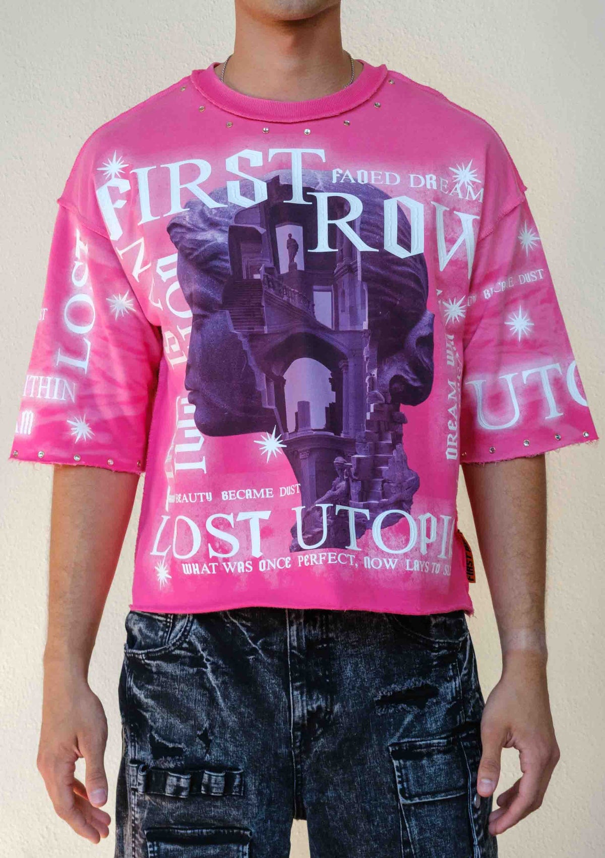 Men's pink cropped terry tee with studded rubber graphic