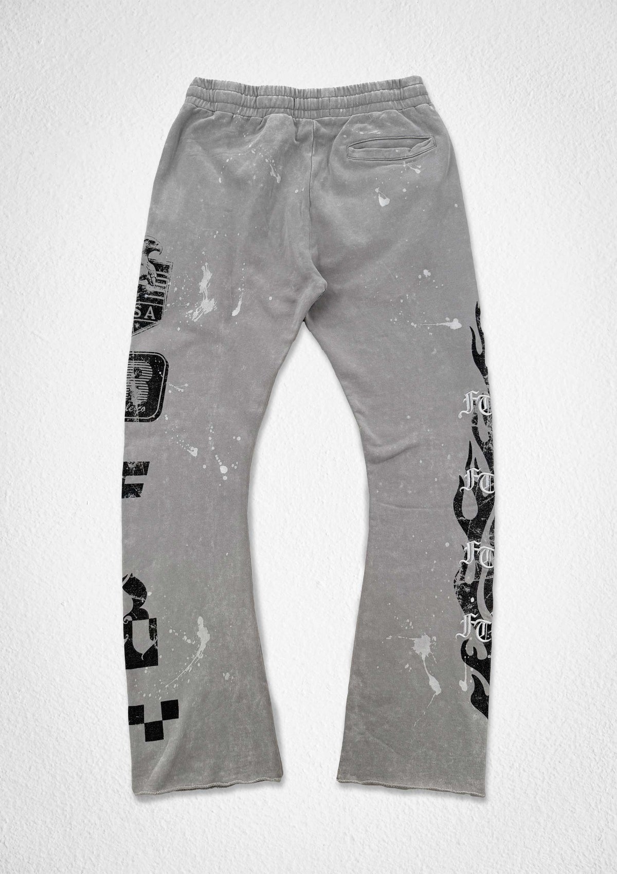 Men's light grey washed flare joggers with flocked graphic
