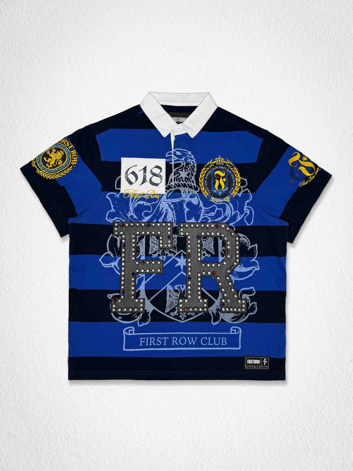 Men's royal blue washed polo with leather appliqué eagle crest patch