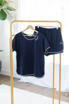 Women's navy cotton pajama short set with embroidered Hope detail and striped piping