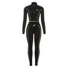 Women's black cropped long sleeve top and slim-fit pants set
