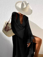 Women's deep V-neck flared sleeve midi dress in white or black – detail view