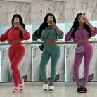 Women's black drawstring long sleeve crop top and high-waisted pants set, view 2