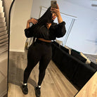 Women's black drawstring long sleeve crop top and high-waisted pants set, view 4