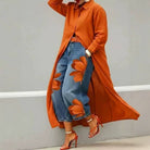 Women's orange floral print wide-leg denim pants – styled view