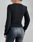 Women's black v-neck long sleeve top with lace, ruching and rhinestone details - photo 4