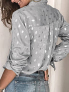 Women's metallic foil button-up lapel shirt in silver or champagne – detail view
