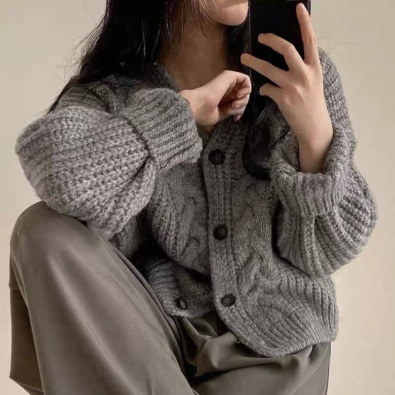Women's oversized V-neck jacquard knit cardigan sweater in pink, gray or cream – detail view