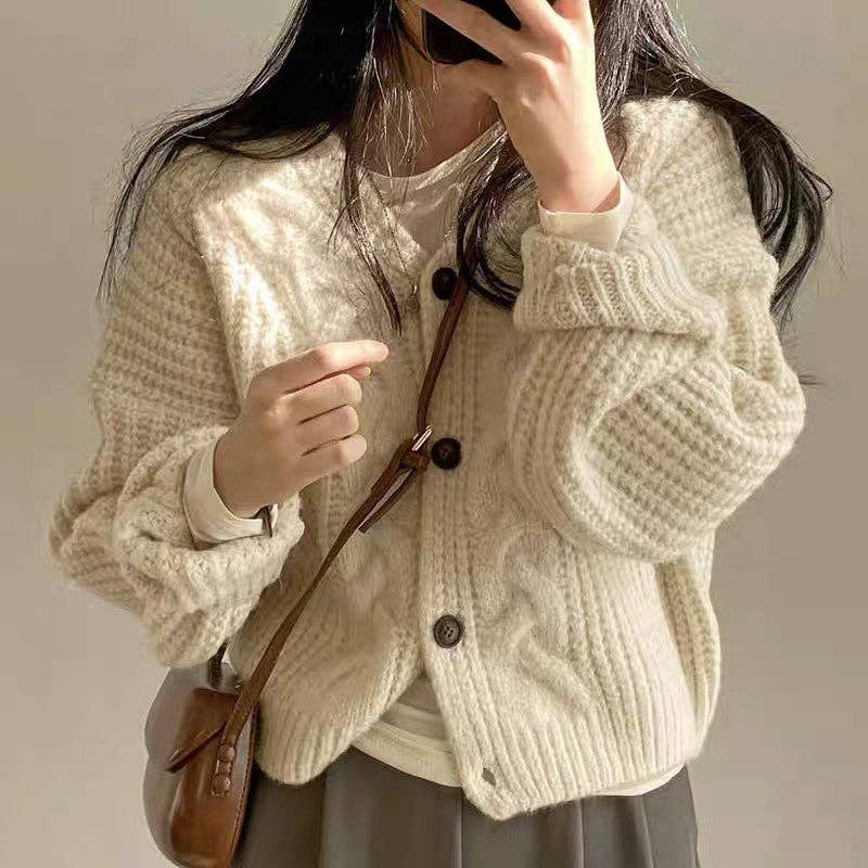 Women's oversized V-neck jacquard knit cardigan sweater in pink, gray or cream – styled view