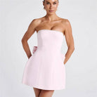 Women's pink pearl bow strapless fitted mini dress