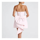 Women's pink pearl bow strapless fitted mini dress – detail view