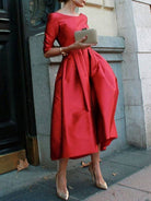 Women's pleated A-line round neck midi dress with pockets in red, green or black – alternate view