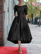 Women's pleated A-line round neck midi dress with pockets in red, green or black – detail view