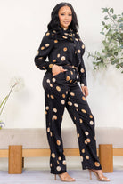 Women's plus size black polka dot tie-neck blouse and wide leg pant set, view 2
