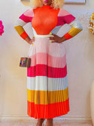 Women's printed mock neck top & pleated midi skirt set in pink, brown, orange or fuchsia – front view