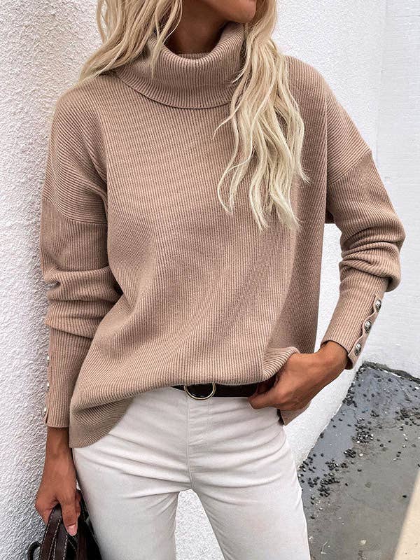 Women's black relaxed high-neck knit sweater with button detail – detail view