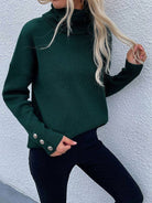 Women's black relaxed high-neck knit sweater with button detail – styled view