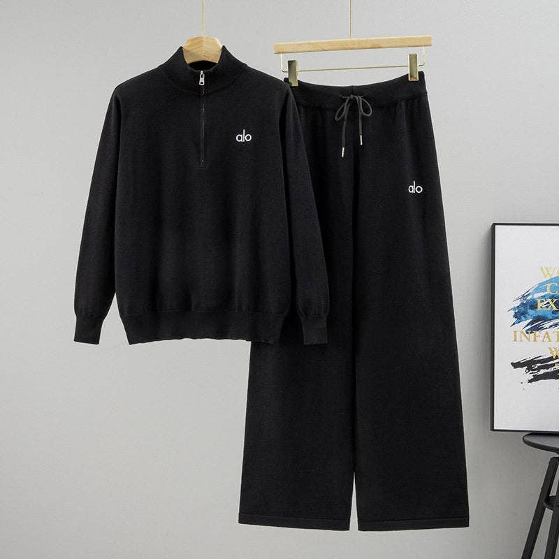 Women's black ribbed half-zip sweater and wide-leg knit pant set – front view