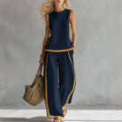 Women's sleeveless contrast trim vest & wide-leg pant set in light blue, dark gray, wine red, navy blue, white or green – front view