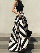 Women's black contrast striped one-shoulder wrap top and maxi skirt set – front view