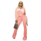 Women's black zip-up hooded crop top and flare pants set, view 4